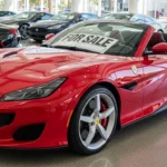 Ferrari Portofino for sale buyer guide infographic showing 2026 used prices, best model years, Portofino vs Portofino M, ownership costs, and resale tips.
